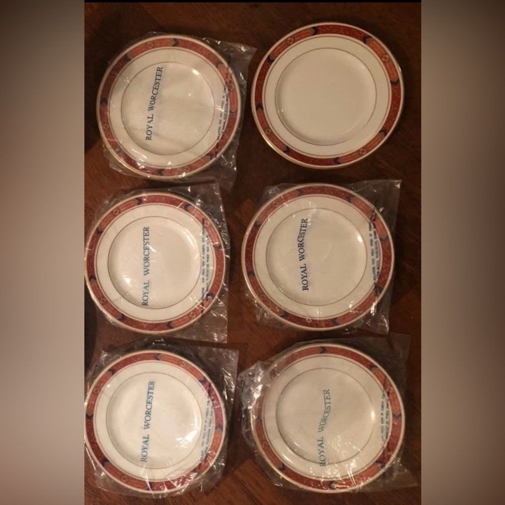 Royal Worcester "Beaufort" pattern navy and rust set of six bread and butters